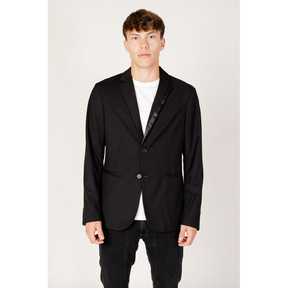 Man wearing Armani Exchange Black Polyester Blazer, contemporary style, durable and light, ideal for various occasions.