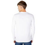 Back view of Armani Exchange White Cotton Long Sleeve shirt worn by a man, showcasing its comfortable fit and premium material.