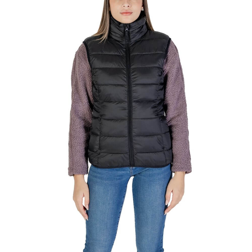 Woman wearing B.Young Black Nylon Sleveless Jacket with quilted design and front zip, ideal for style and comfort.