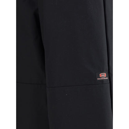 Balenciaga Black Cotton Casual Pants with motif detail, featuring durable cotton twill and workwear-inspired design elements.