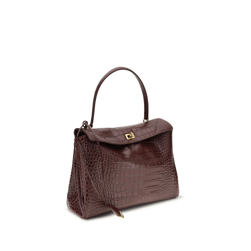 Balenciaga Brown Calf Leather Bos Taurus Handbag in crocodile-effect design with flap closure and removable handle. Luxury accessory for AW25.