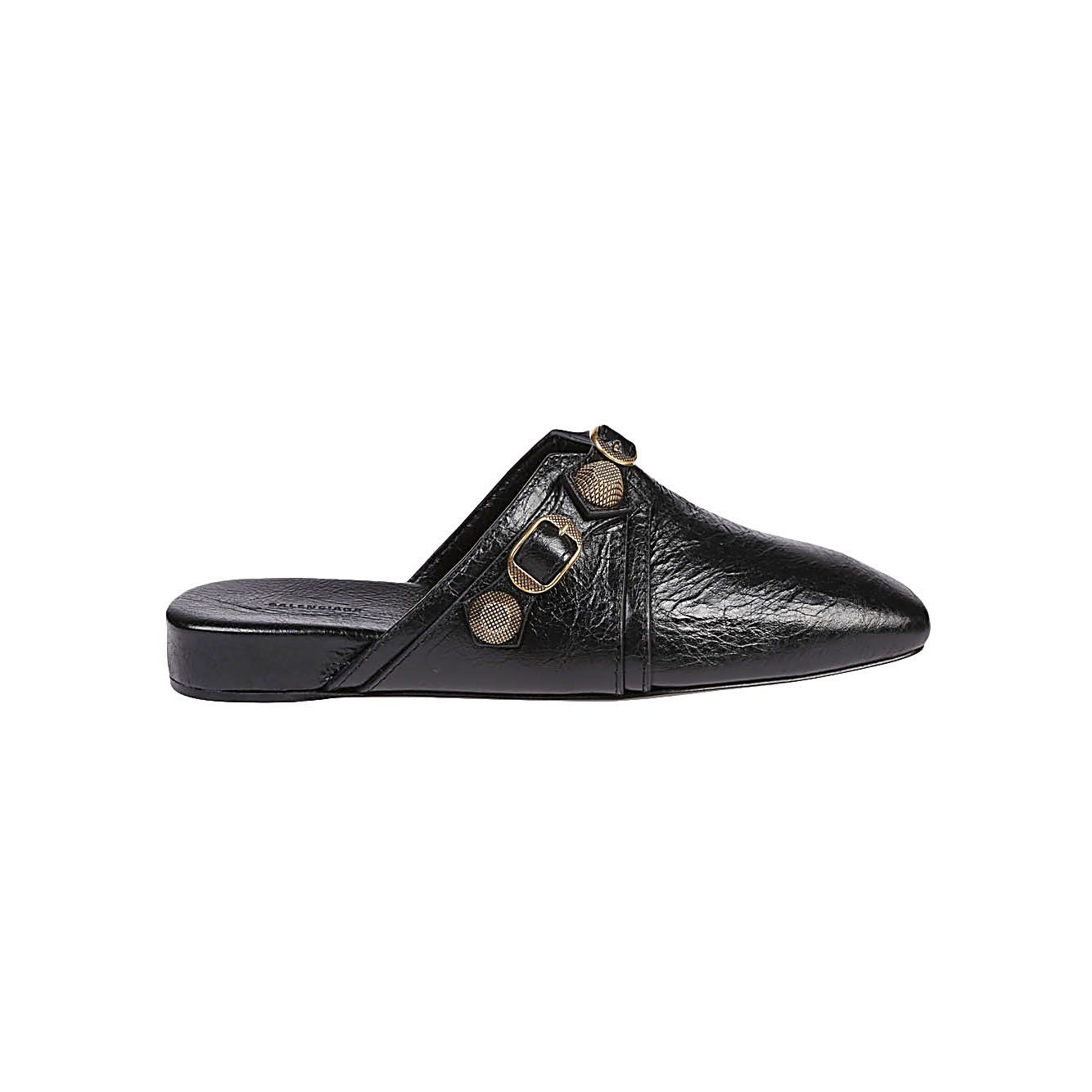 Balenciaga Cozy Cagole leather mules in black with silver studs, buckle closure, square toe, slip-on design, and black leather sole.