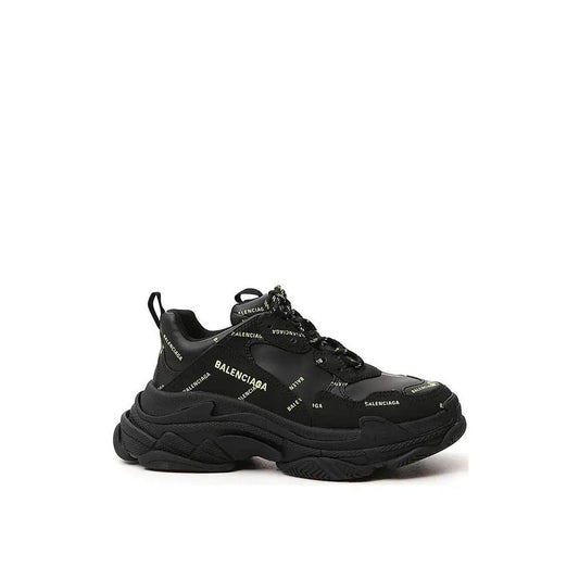Balenciaga Triple S Sneakers, black with all-over logo detail, 100% calf leather, fabric inner, rubber sole, round toe, lace-up closure.