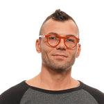 Stylish man wearing Bally Orange Men Glasses Frame with full-rim acetate design and demo lenses, perfect for a modern look.