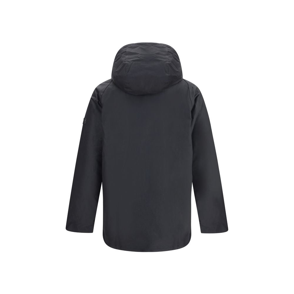 Rear view of Barbour International Black Cotton Parka showcasing adjustable hood and sleek design for a stylish winter outfit.