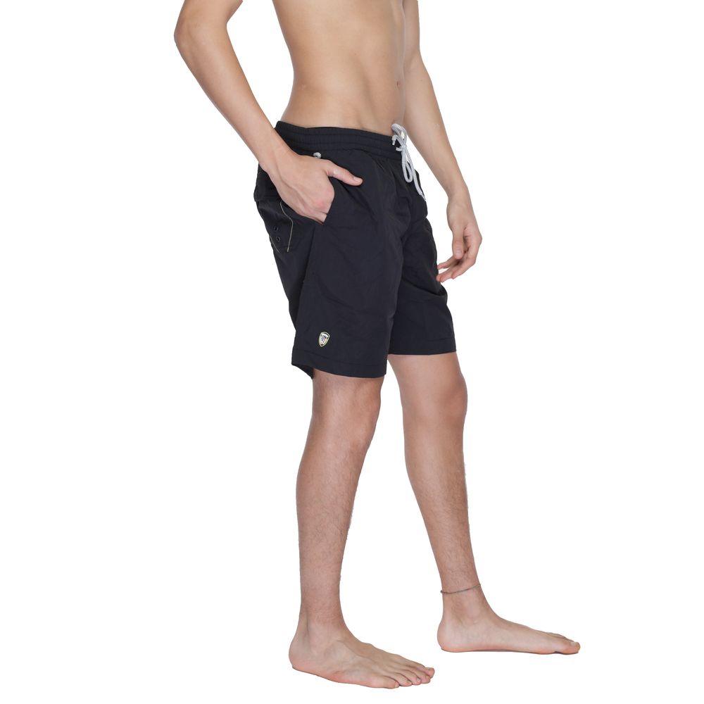 Blauer Black Polyamide Swim Shorts with elastic waistband and logo, side view of person wearing swim boxer, perfect for beach or pool.