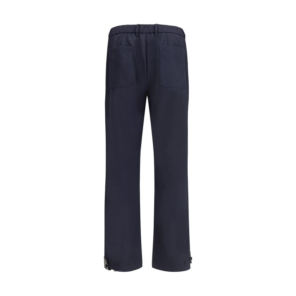 Back view of Brioni Blue Wool Casual Pants featuring elasticized hem and belt loops, showcasing elegant and modern slim fit style.