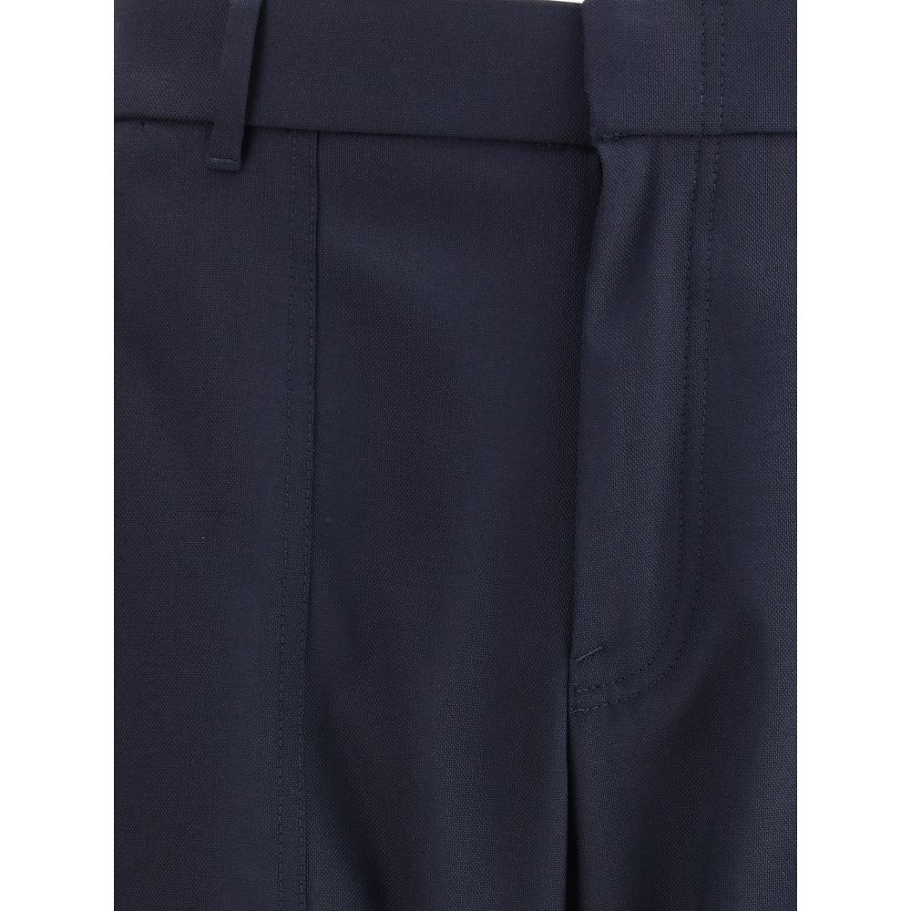 Brioni Blue Wool Casual Pants with elasticized hem and belt loops, showcasing refined style and practical patch pockets for a modern look.
