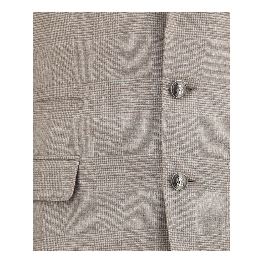 Close-up of Brunello Cucinelli Beige Silk Two-Piece Suit fabric and buttons detail.
