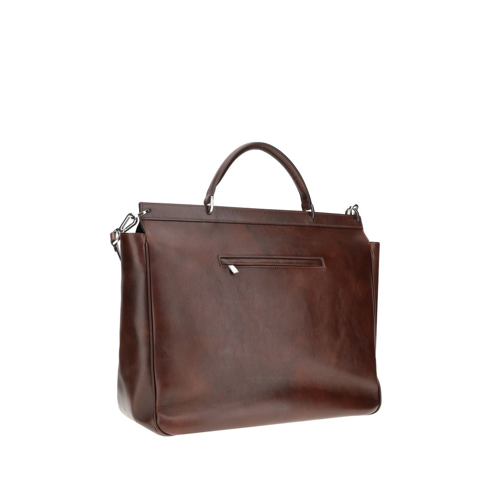 Front view with bag zipped and handles upright.