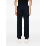 Back view of Brunello Cucinelli Trousers Blue showcasing tapered leg and elastic waistband.