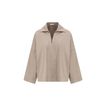 Brunello Cucinelli Wide Shirt with V-neck and jeweled embellishment, classic collar, and wide sleeves in beige, SS25 collection.