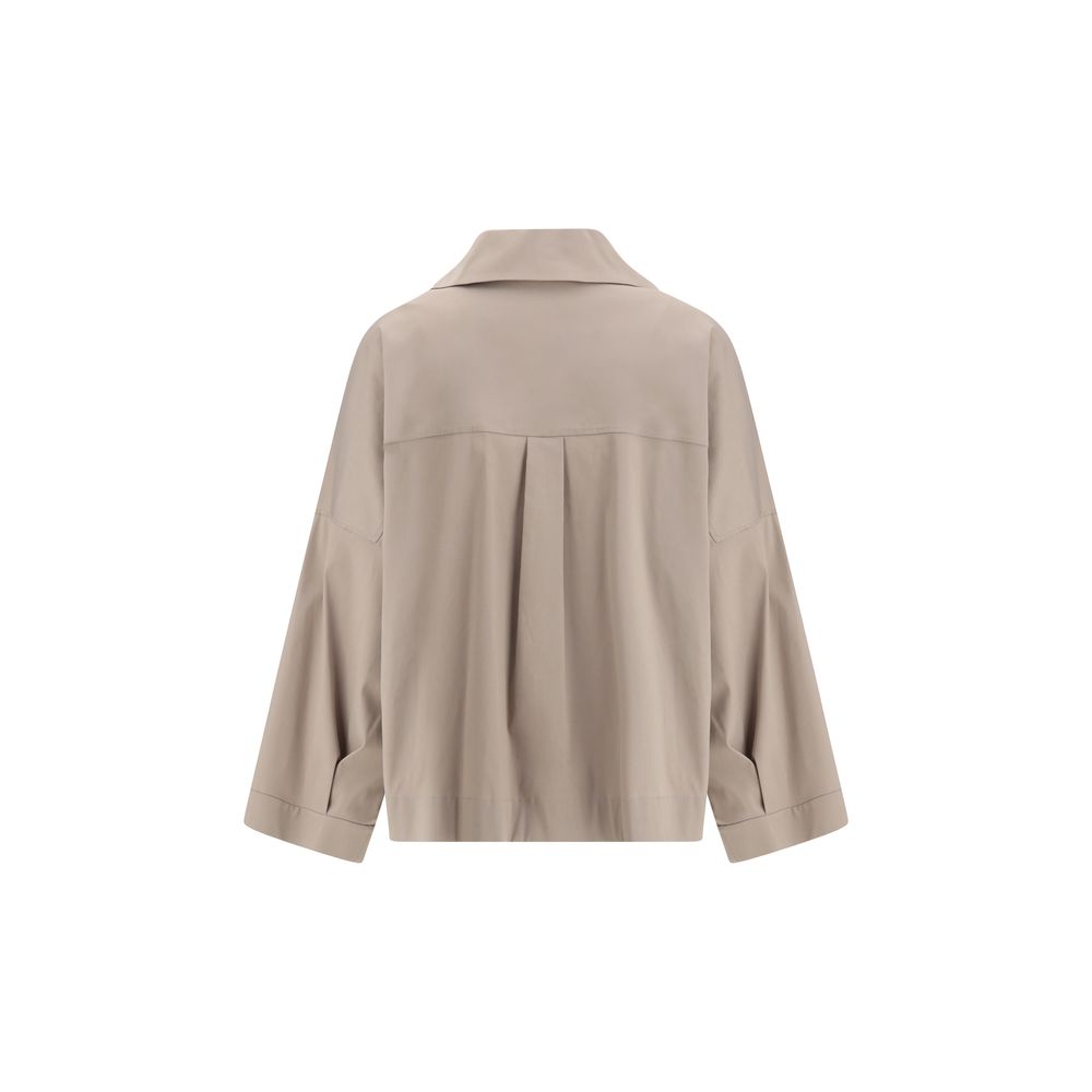 Back view of Brunello Cucinelli Wide Shirt with classic collar and wide sleeves in beige color, elegant and sophisticated fit for SS25.