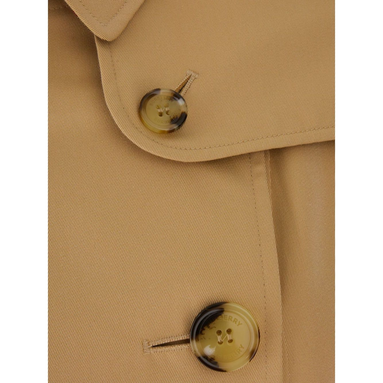 Close-up of buttons on Burberry Double-breasted cotton trench coat in archive beige gabardine weave fabric