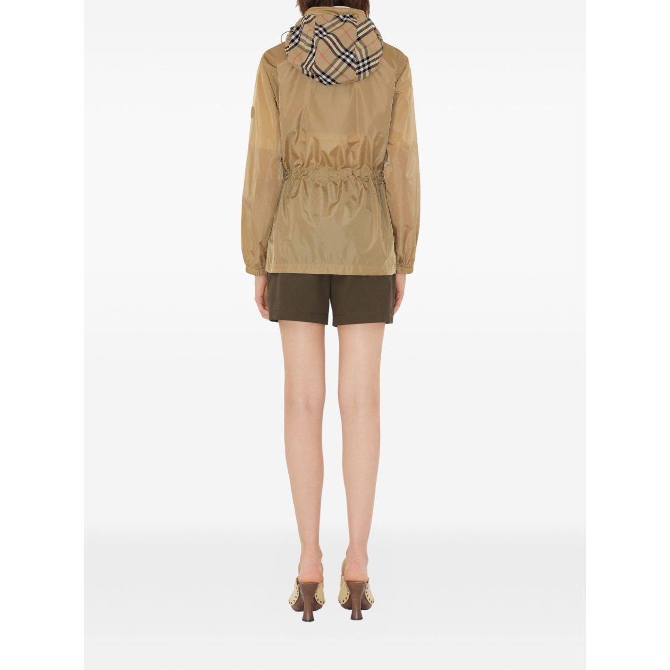 Back view of Burberry Short nylon parka with check motif, showcasing stylish design and hood detail, ideal for fashion-forward individuals.