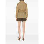 Rear view of Burberry Short nylon parka with check motif, worn by woman in heels, showcasing lightweight design.