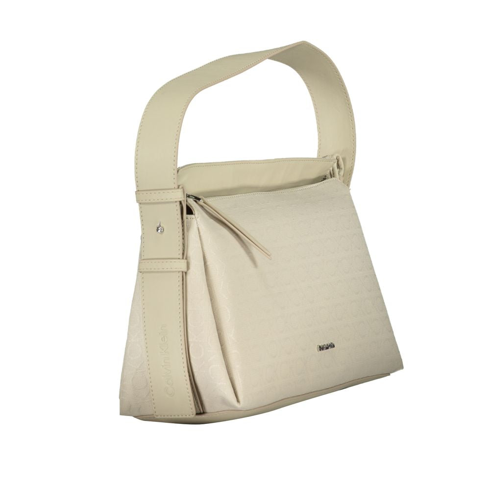 Calvin Klein Beige Polyester Handbag with adjustable shoulder handle, internal document pocket, and zip closure.