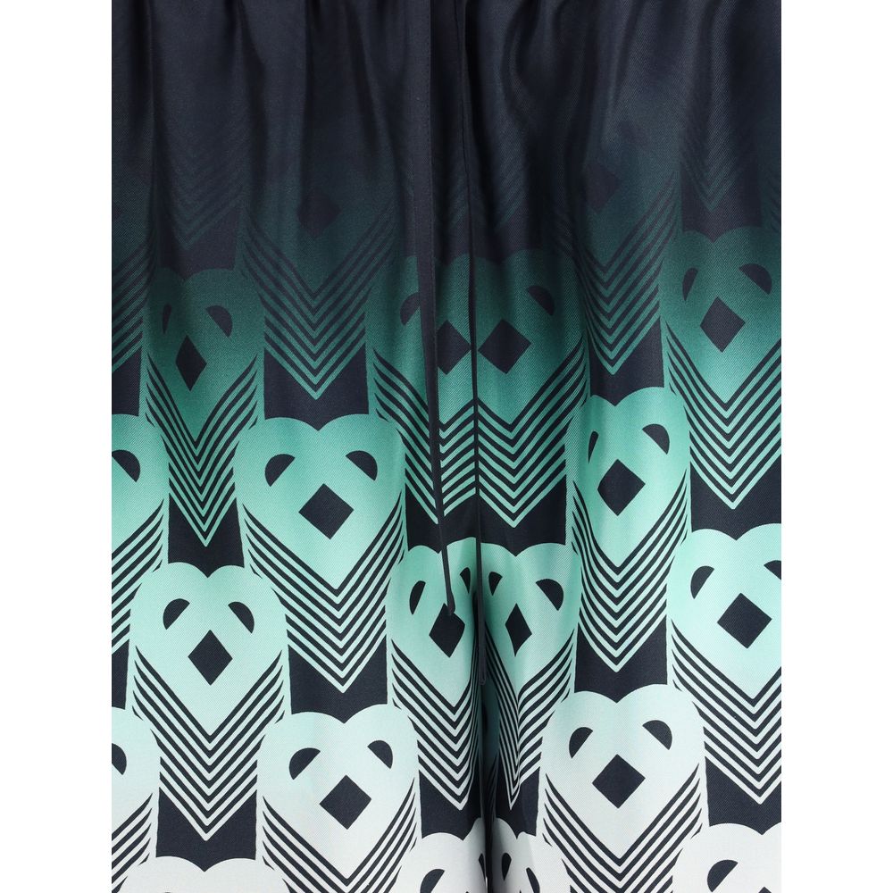 Casablanca Multicolor Silk Bermuda Shorts featuring heart monogram print on mint and black silk, inspired by Tokyo's Park Hyatt design.