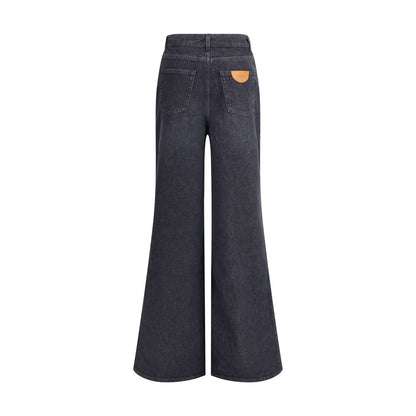 Chloé Black Cotton Flared Jeans back view showing leather logo patch and flared leg design, ideal for versatile and refined casual looks.
