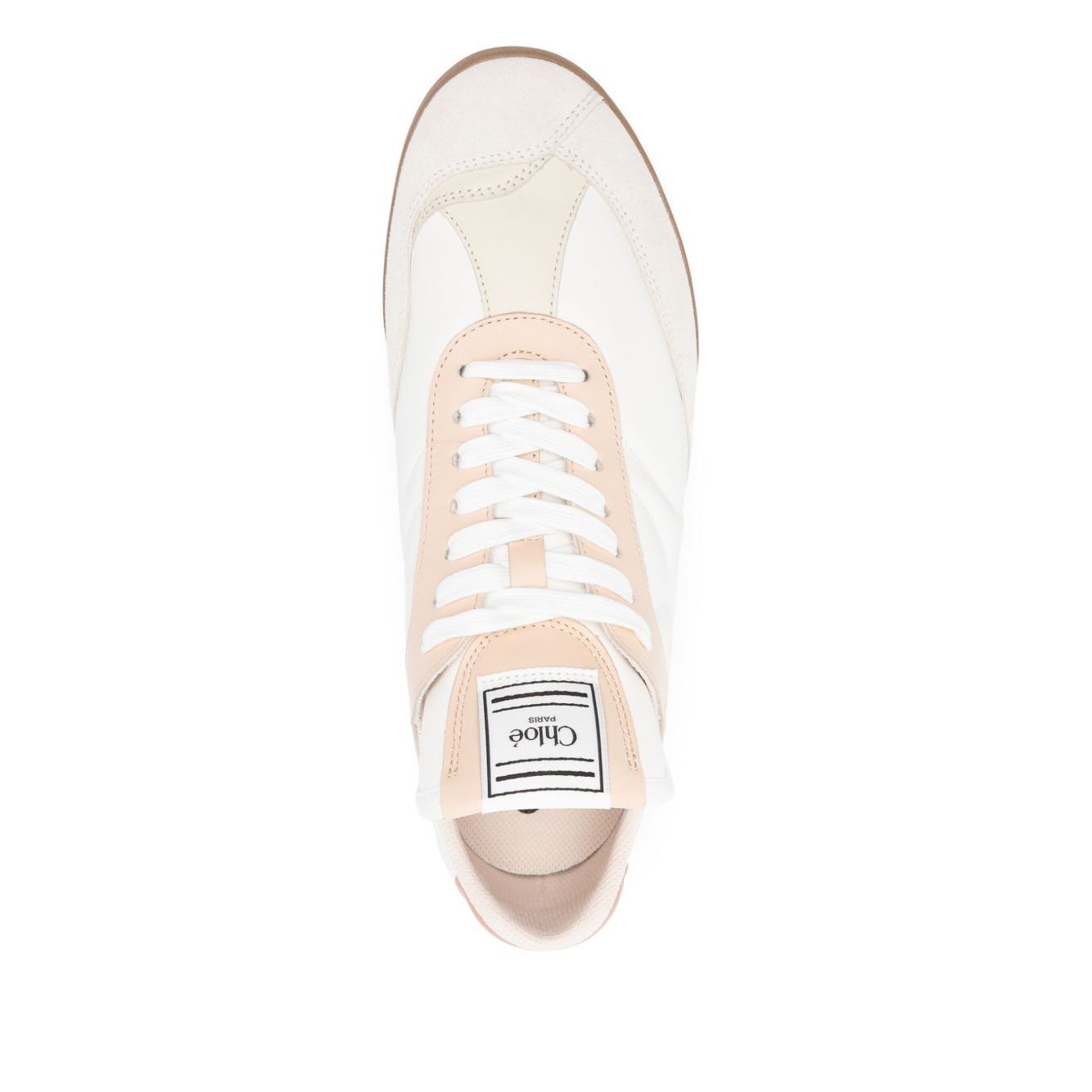 Top view of a Chloé Kick sneaker in light beige with front lace-up and padded ankle, featuring a flat rubber sole and protective dust bag.