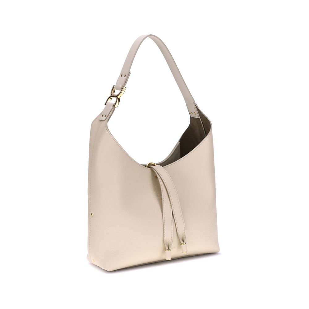 Front view with bag zipped and handles upright.