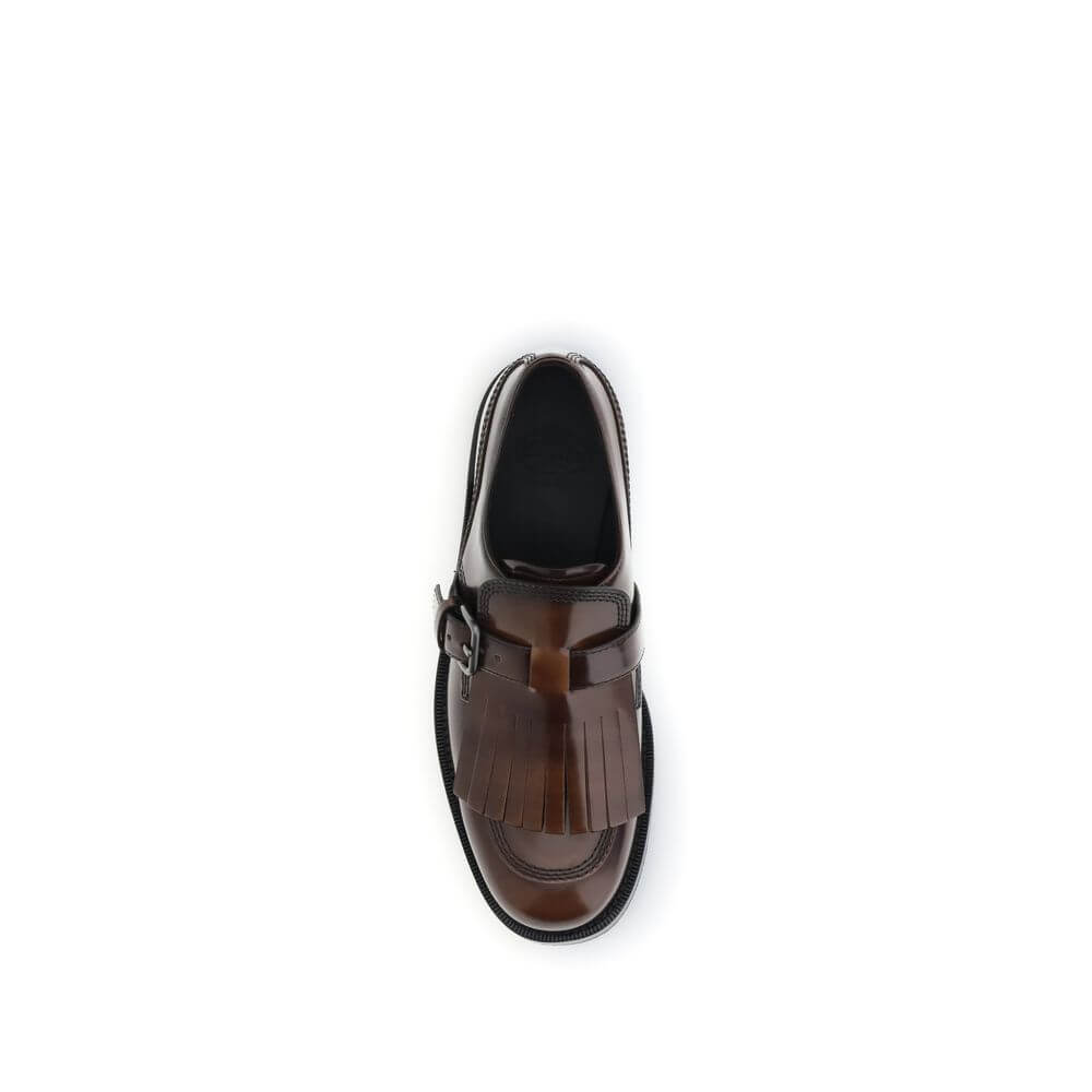 Church's Brown Calf Leather Bos Taurus Oxfords And Derbies with buckle and fringe design, top view.