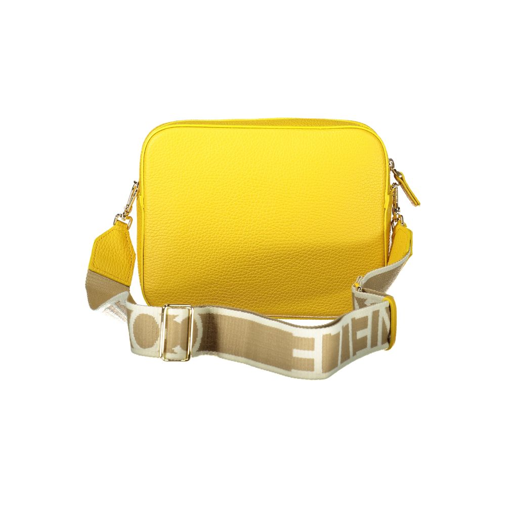 Coccinelle Yellow Leather Women Handbag with adjustable shoulder strap, showcasing its vibrant color and stylish design.