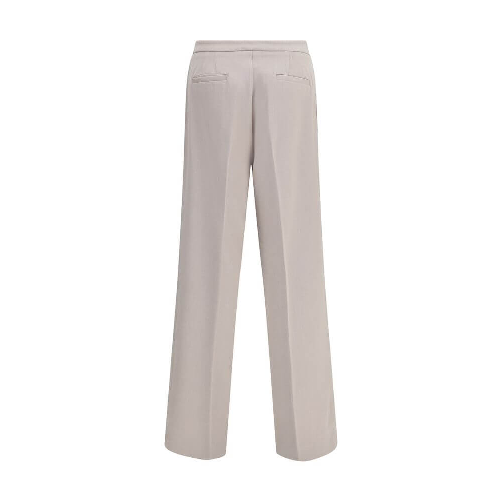 Back view of Cruna Beige Polyester Casual Pants with wide leg design, featuring two welt pockets and a clean, versatile silhouette.
