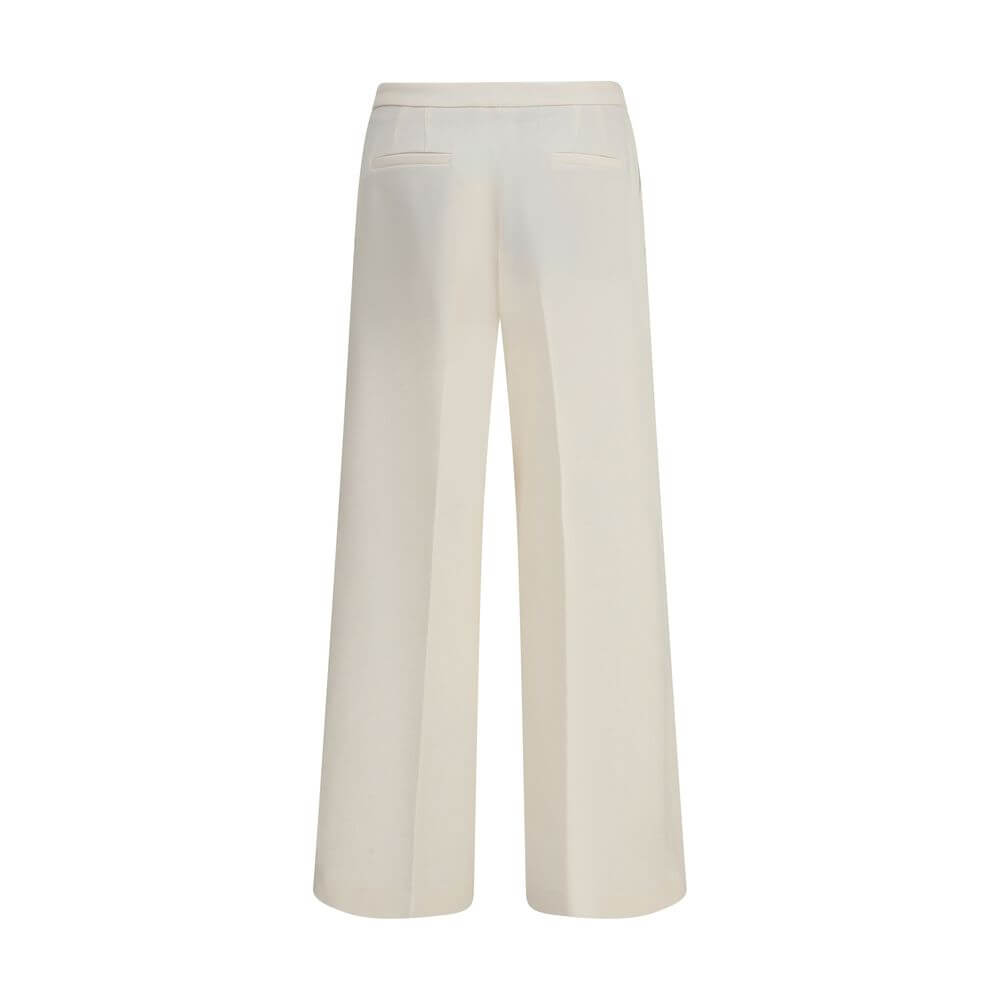 Back view of Cruna Cream Polyester Casual Pants with wide legs, featuring back welt pockets, ideal for versatile casual and refined looks.