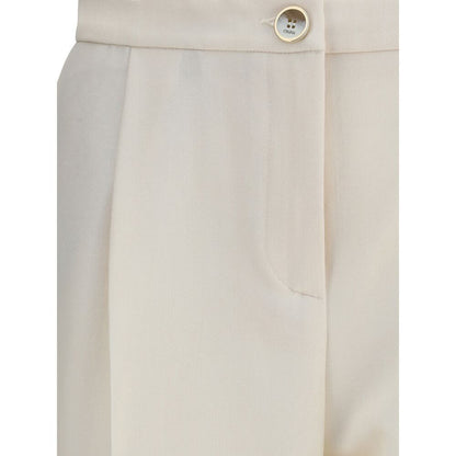 Close-up of Cruna Cream Polyester Casual Pants showing front zip and button details.
