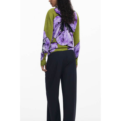 Back view of model wearing Desigual Purple Elastane Women Sweater with bold floral design.
