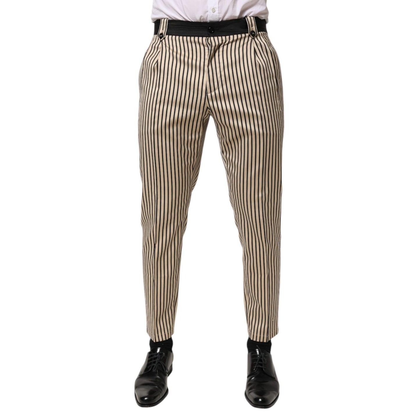 Dolce & Gabbana Beige Black Striped Cotton Slim Fit Trousers Pants on model, featuring tapered design and elegant vertical stripes.