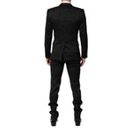 Back view of Dolce & Gabbana Black 3 Piece Brocade Jacquard Suit MARTINI with floral jacquard pattern, includes blazer, waistcoat, trousers.
