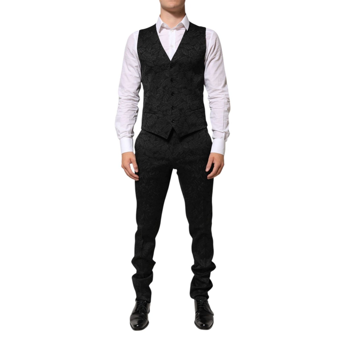 Man wearing Dolce & Gabbana Black 3 Piece Brocade Jacquard Suit MARTINI with waistcoat and trousers, perfect for formal events.