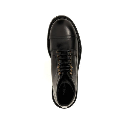 Top view of Dolce & Gabbana Black Calfskin Lace-Up Boots, showcasing round toe design and leather composition.