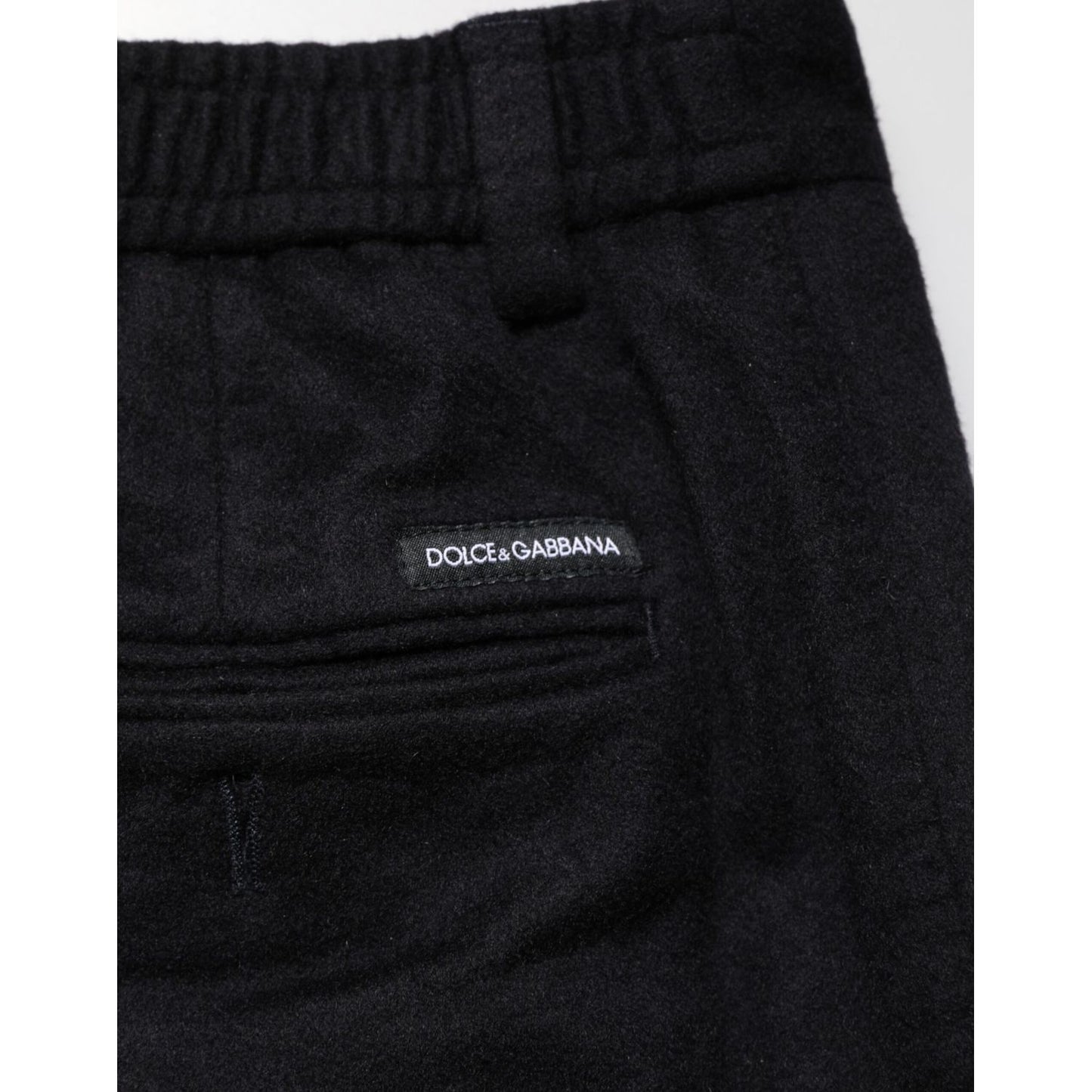 Dolce & Gabbana Black Cashmere Dress Formal Men Trouser Pants showcasing brand detail and luxurious material up close.