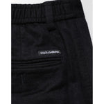 Dolce & Gabbana Black Cashmere Dress Formal Men Trouser Pants showcasing brand detail and luxurious material up close.