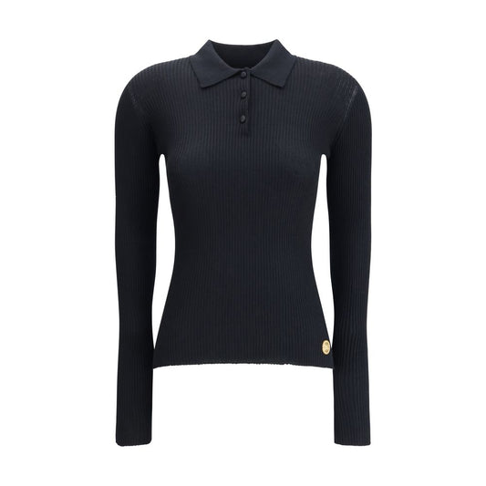 Dolce & Gabbana Black Cashmere Polo Shirt with ribbed design, classic collar, and three-button closure for elegant and versatile style.