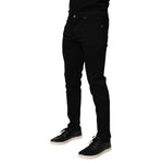 Dolce & Gabbana Black Cotton Blend Skinny Men Trouser Pants shown with casual sneakers.