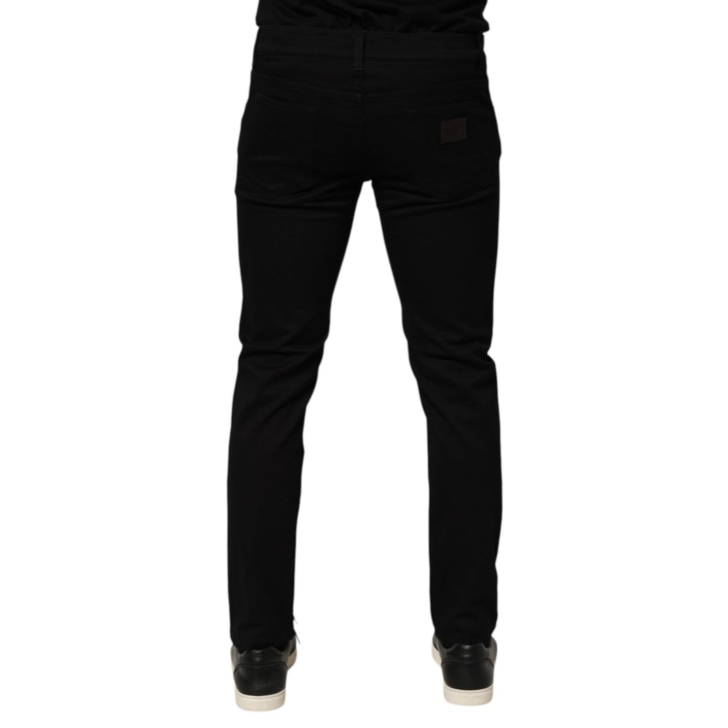 Back view of Dolce & Gabbana Black Cotton Blend Skinny Men Trouser Pants showcasing tailored fit and sleek design.