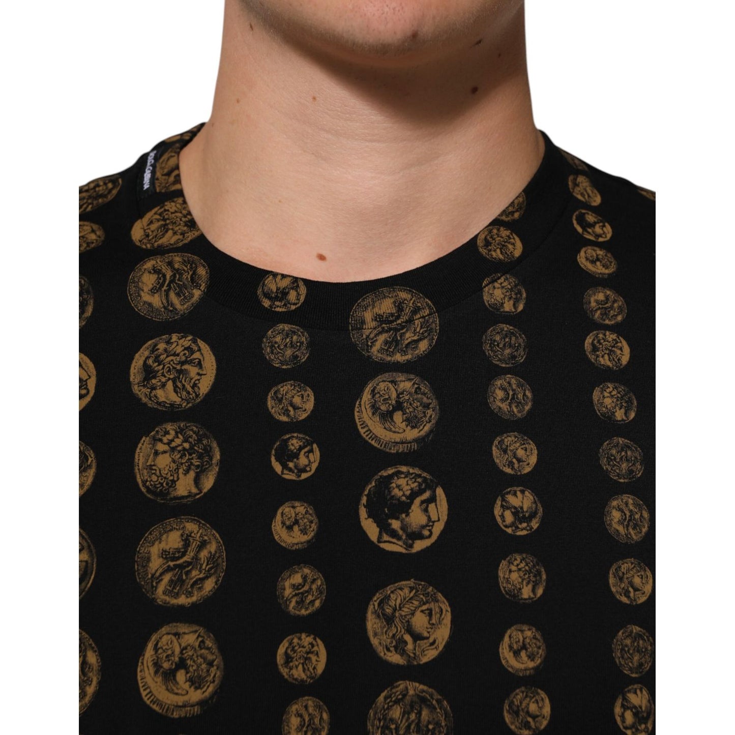 Dolce & Gabbana Black Cotton Coin Print Crew Neck T-shirt featuring gold coin graphics on a black background with classic crew neck.