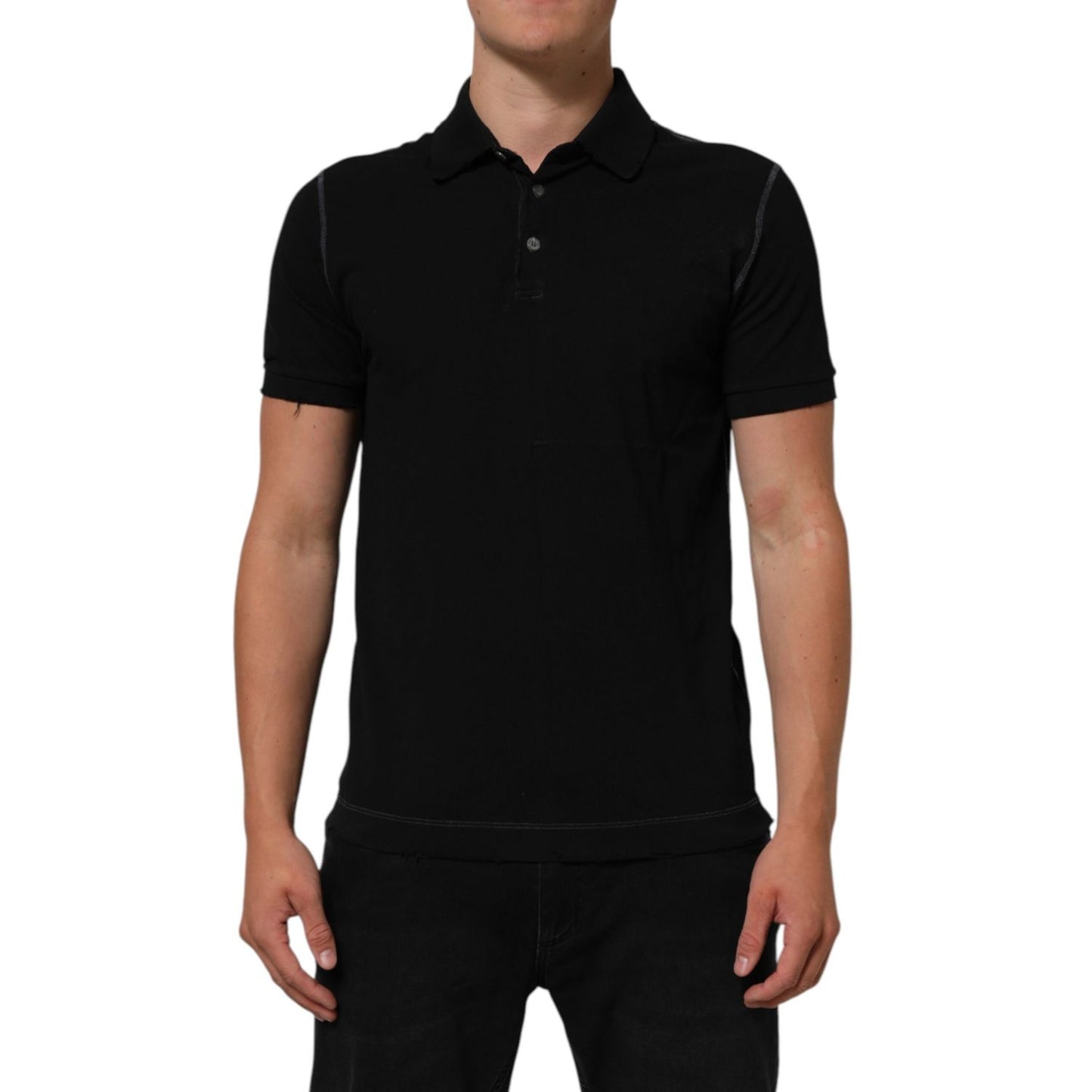 Person wearing Dolce & Gabbana Black Cotton Graphic Print PoloShirt T-shirt with classic collar and button placket.