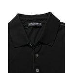 Dolce & Gabbana Black Cotton Graphic Print PoloShirt T-shirt with classic collar and button placket, close-up view.