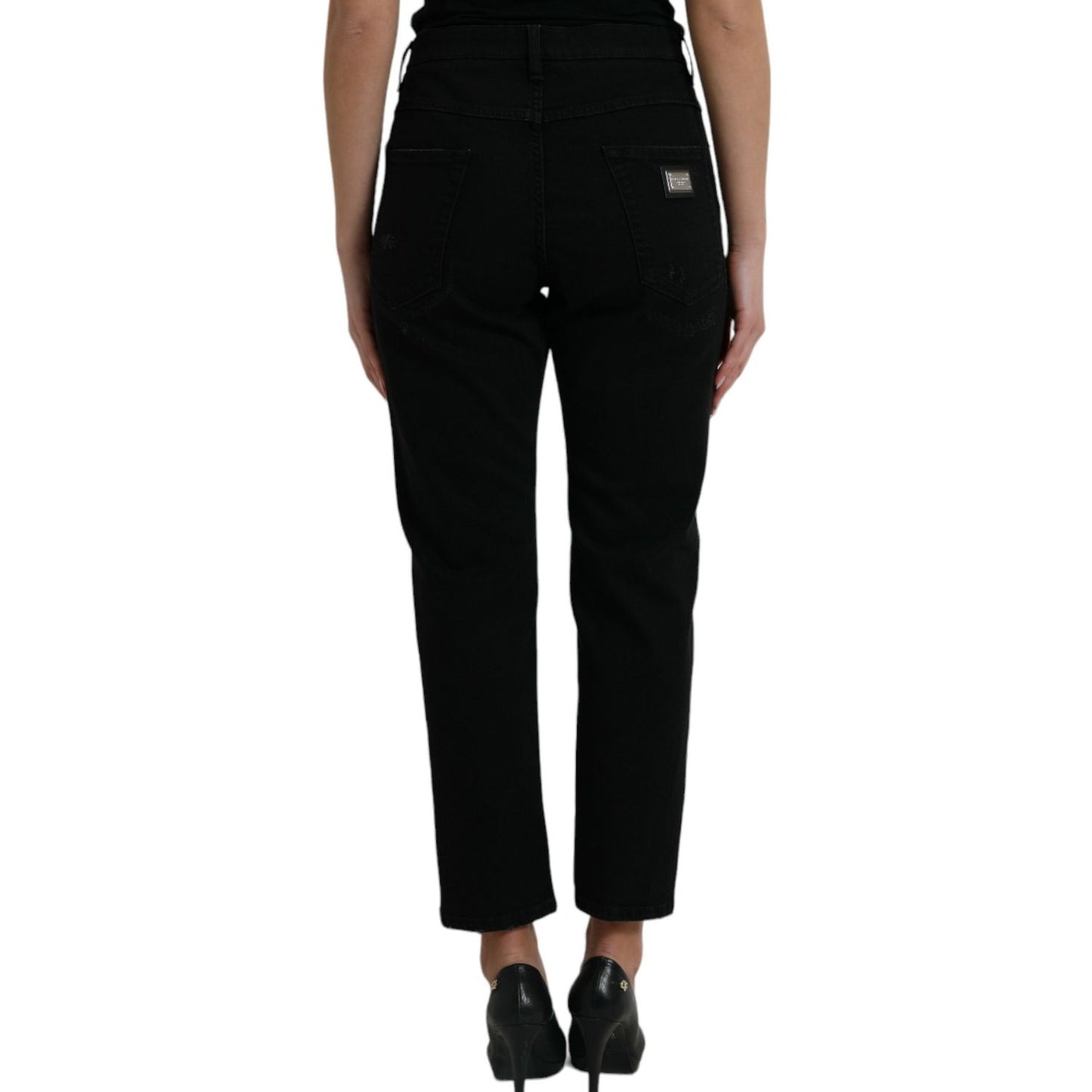 Back view of Dolce & Gabbana Black Cotton High Waist Tattered Denim Jeans showcasing high craftsmanship and exclusive design.