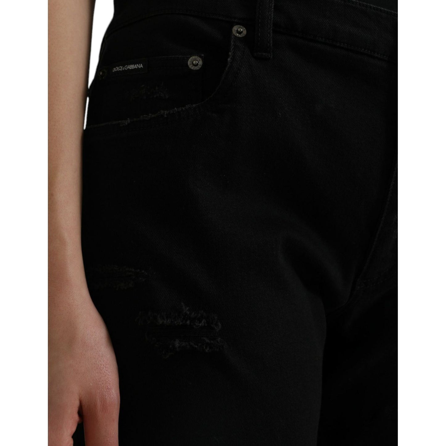 Dolce & Gabbana Black Cotton High Waist Tattered Denim Jeans with zipper closure, logo details, and crafted in Italy.
