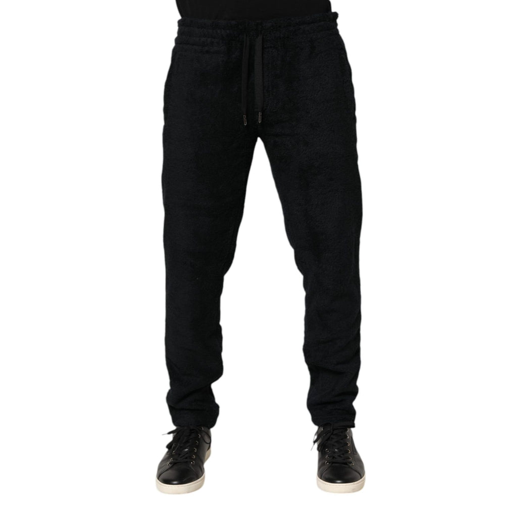Dolce & Gabbana Black Cotton Logo Men Jogger Sweatpants Pants with drawstring waistband and tapered fit, ideal for comfortable streetwear.