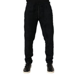 Dolce & Gabbana Black Cotton Logo Men Jogger Sweatpants Pants with tapered fit and adjustable waistband for comfort and style.