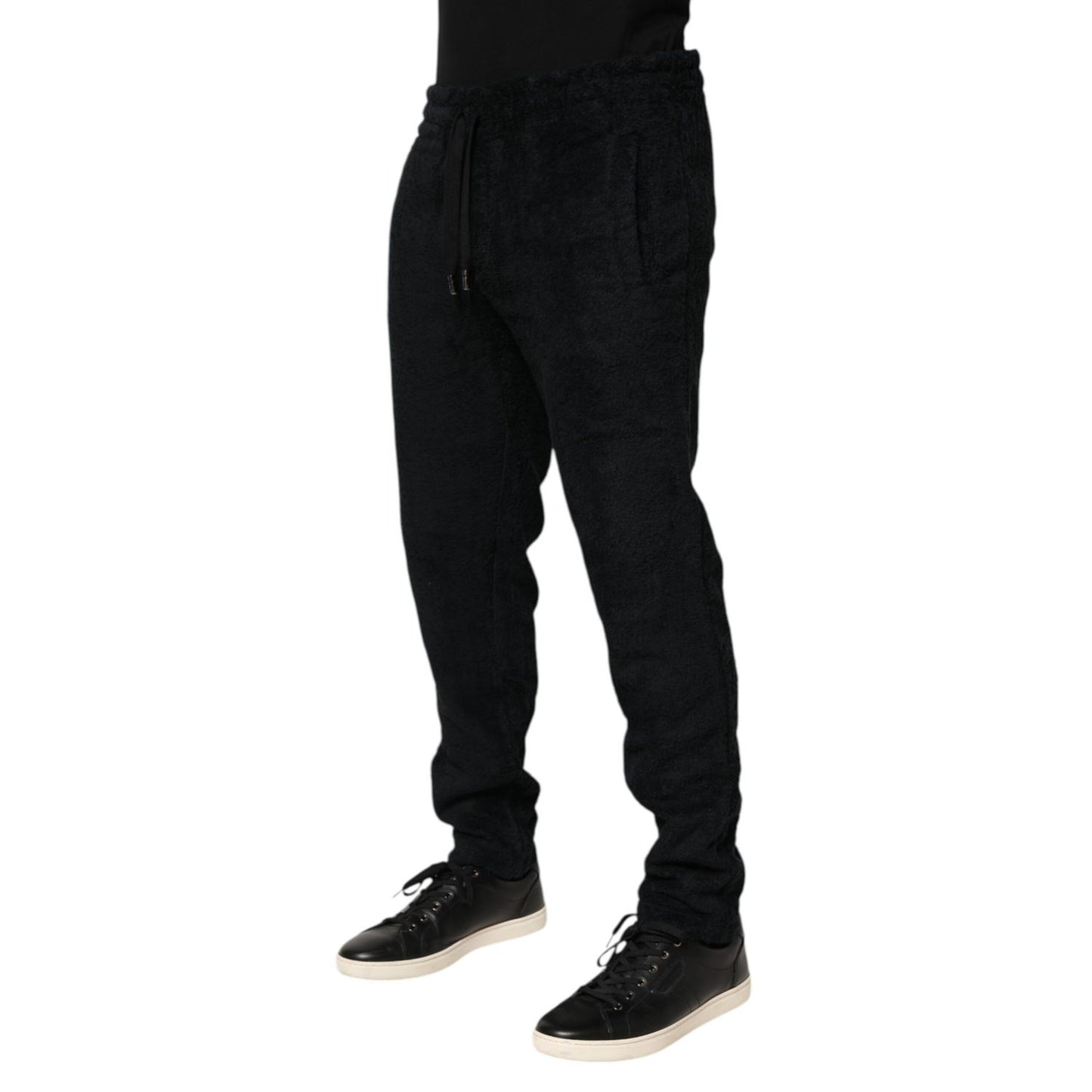 Dolce & Gabbana Black Cotton Logo Men Jogger Sweatpants Pants with drawstring waistband and tapered fit, perfect for luxury streetwear style.
