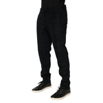 Dolce & Gabbana Black Cotton Logo Men Jogger Sweatpants Pants with drawstring waistband and tapered fit, perfect for luxury streetwear style.