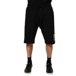 Dolce & Gabbana Black Cotton Mid Waist Casual Bermuda Short featuring drawstring closure and logo details, made in Italy.